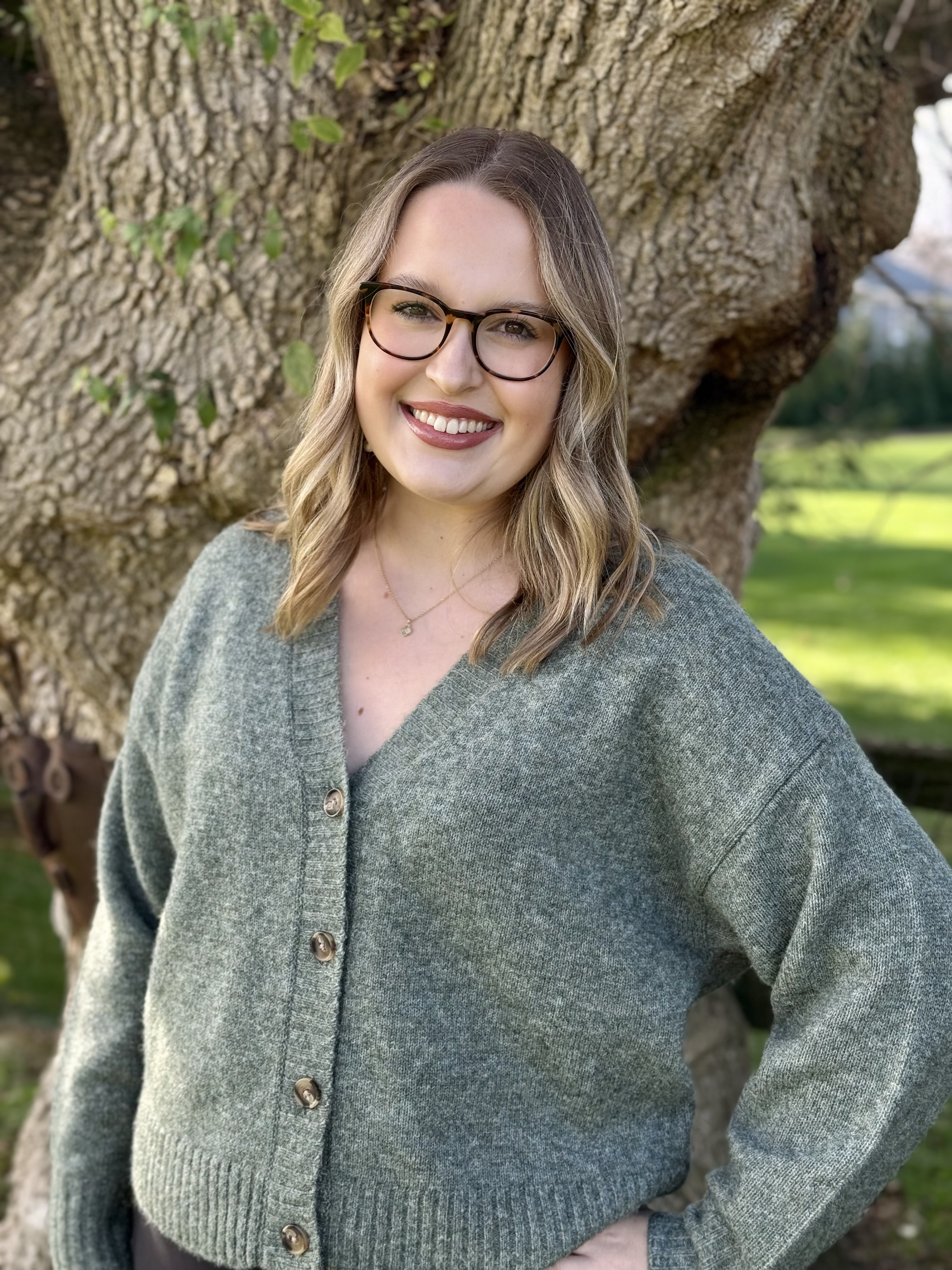 Elle Walters standing and smiling